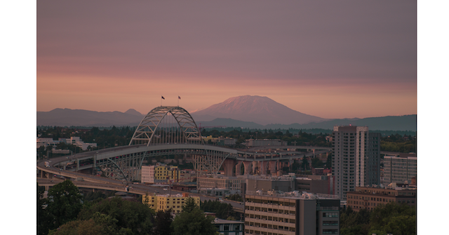 Image of bridge in Portland with Mt Saint Helens in the background